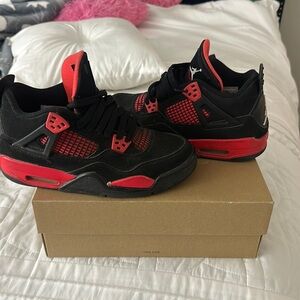 Jordan 4s retro red thunders